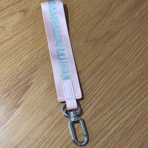 Lululemon Pink Keychain with Silver Accents